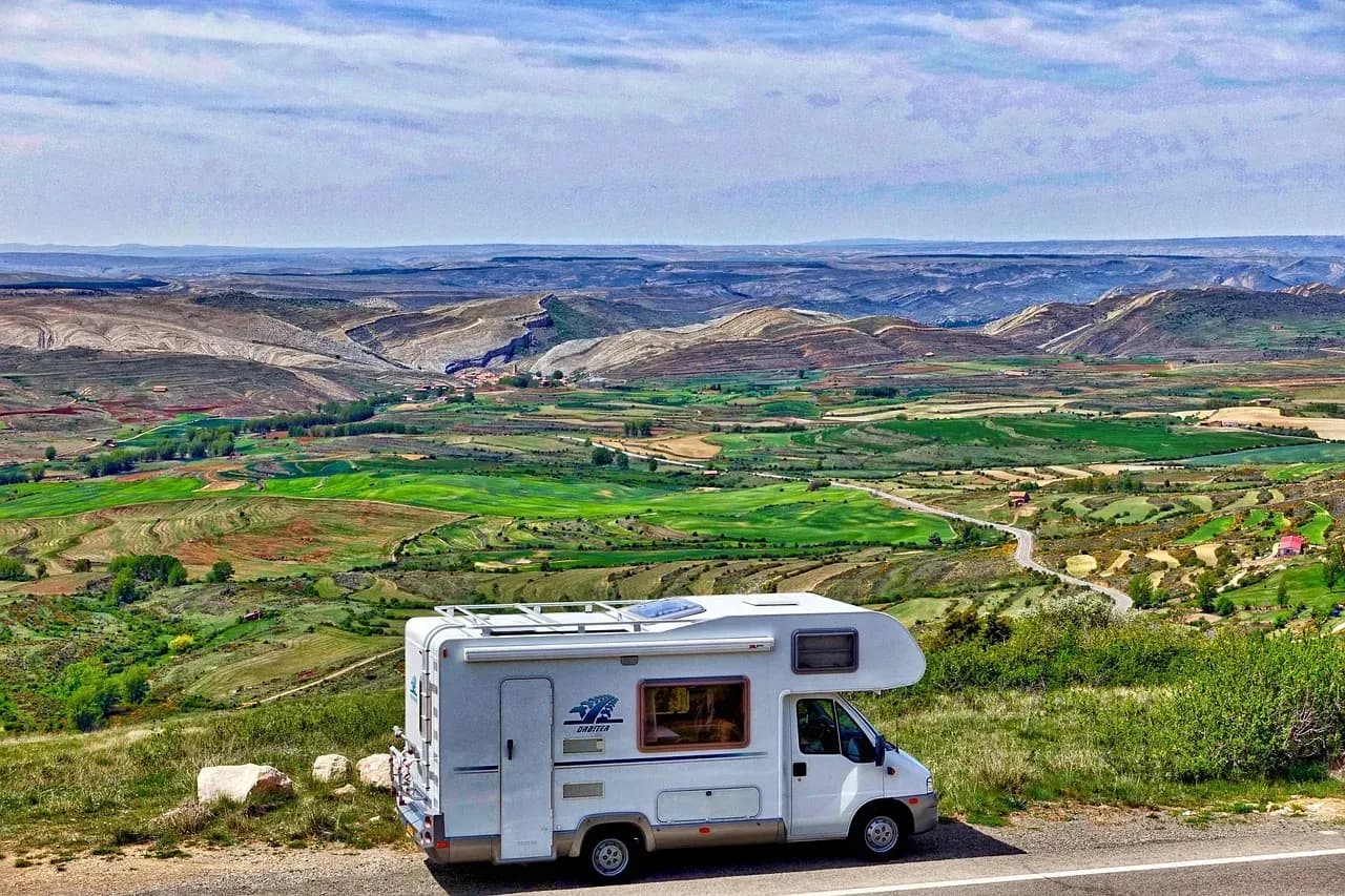 Group of motorhomes parked at a camping site